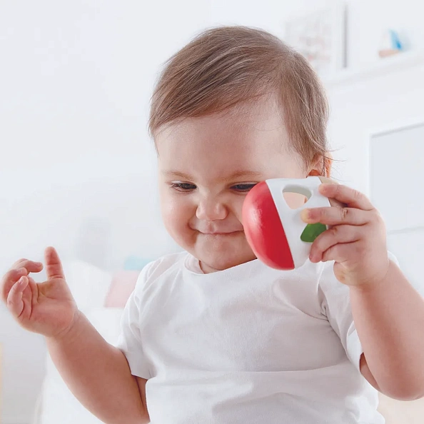 Hape игрушка 3 в 1 погремушка - неваляшка - бумеранг Звон колокольчика - фото  3