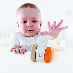 Hape игрушка 2 в 1 - погремушка и каталка на колесах Роллер
